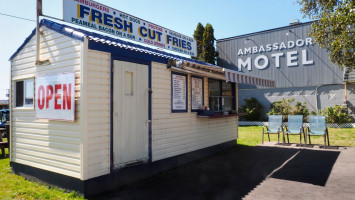 Ambassador Fries outside