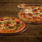 Ikke-Veg Paradise Pizza-Medium Kheema Og Pølse Pizza-Medium (Gratis)