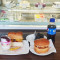 Meal For 2 1 .Vada Pav (2Pcs)+1. Veggie Burger +2 Pudding Or Lava +2 Small Coke